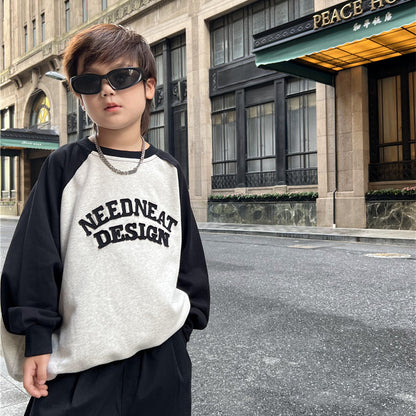 Young idol autumn children's clothing sweaters Korean version of the cloth art letters, edges, colorful children, boys and girls sweaters